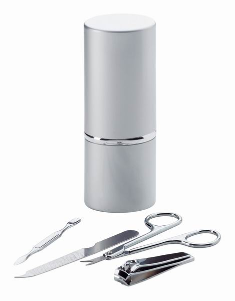 Manicure set in tubular metal case