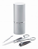 Manicure set in tubular metal case